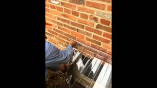 Installing A Window Well Guard [upl. by Elehcor]